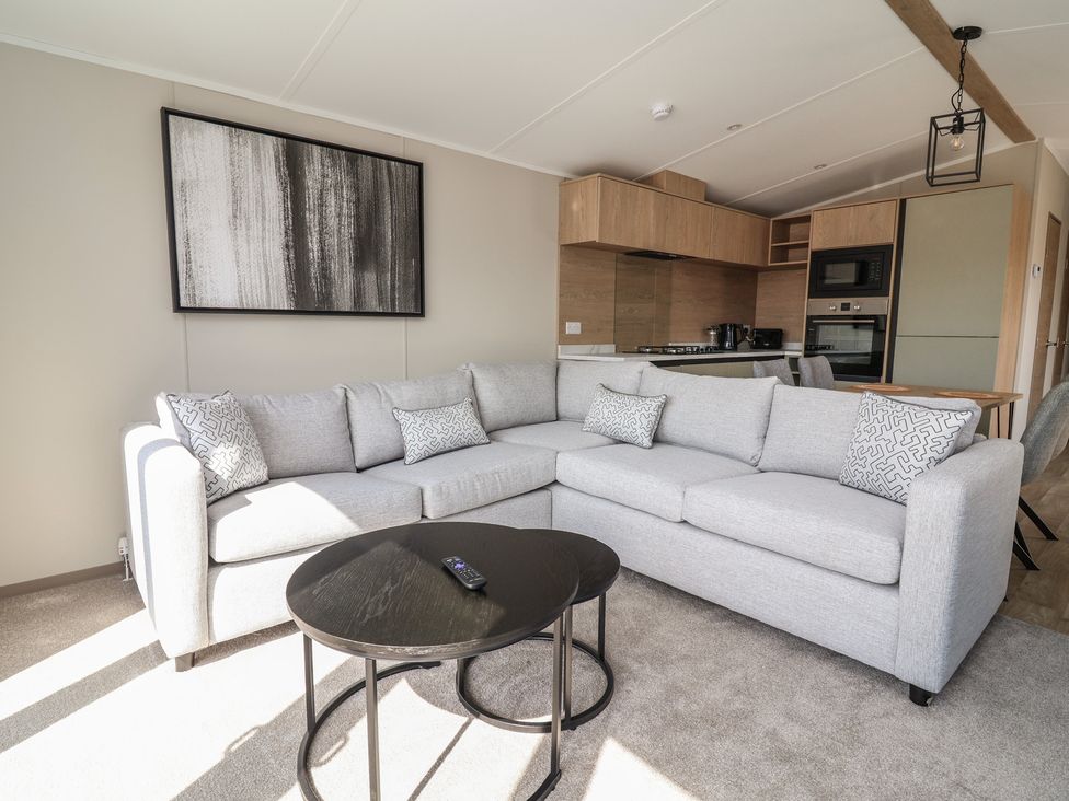 A living room with a sofa and coffee table at No.6 - The Pines, Delamere