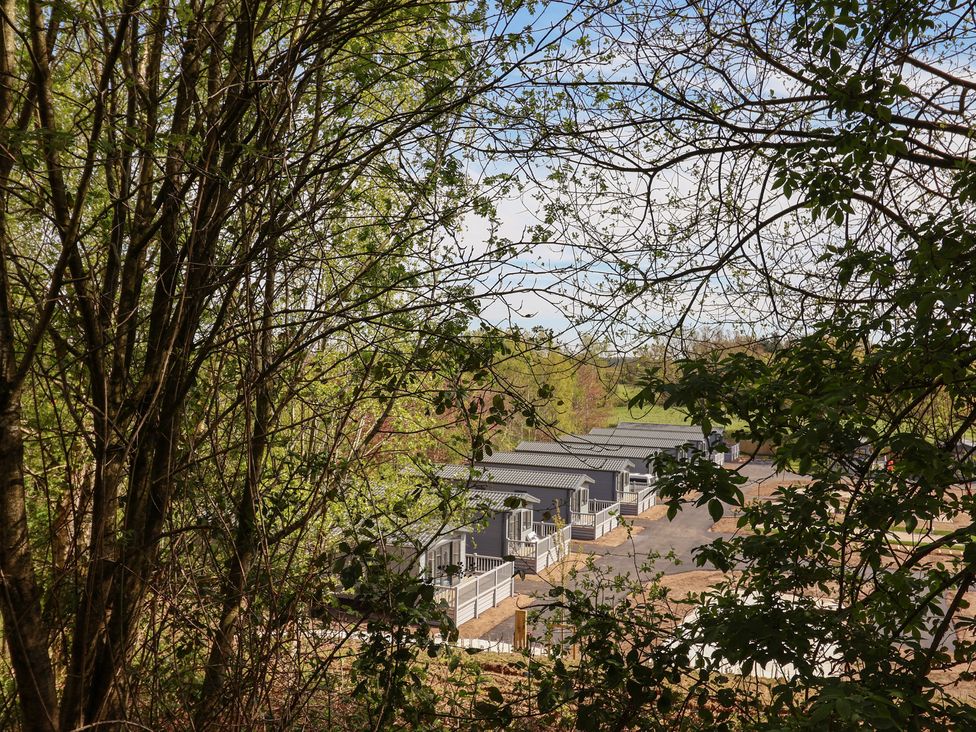 View of cabins surrounded by trees at No.6 - The Pines in Delamere