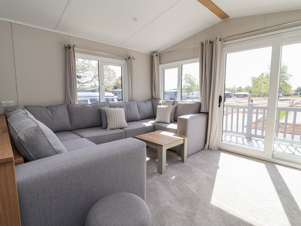 A living room with a sofa and coffee table at No.20 - The Oaks in Delamere