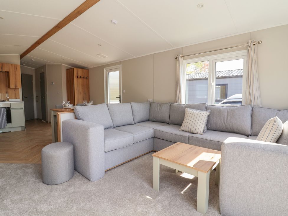 A living room with a sofa and coffee table at No.20 - The Oaks in Delamere