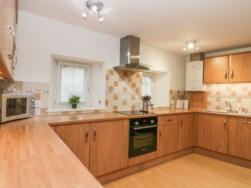 A kitchen with countertop and appliances at Hay Loft in Anstruther