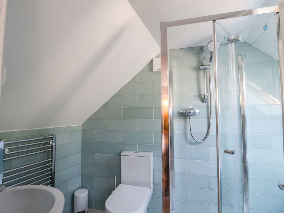 A bathroom with a shower and toilet at Hay Loft in Anstruther