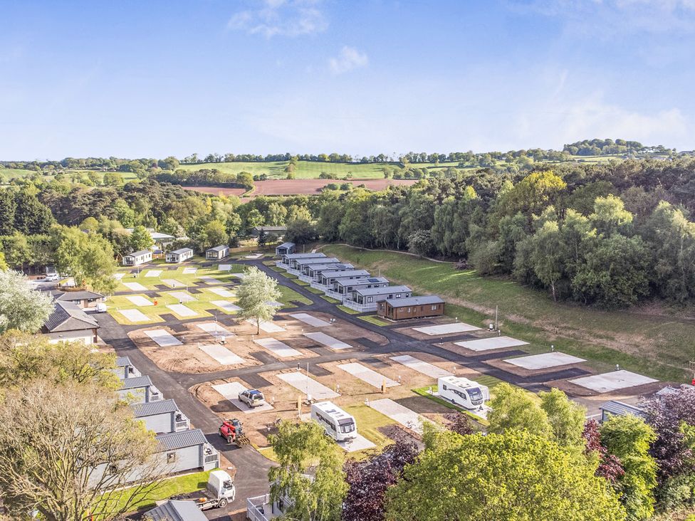 An outdoor area with caravans and land plots at Cedar Lodge 2 Bedrooms with hot tub Delamere