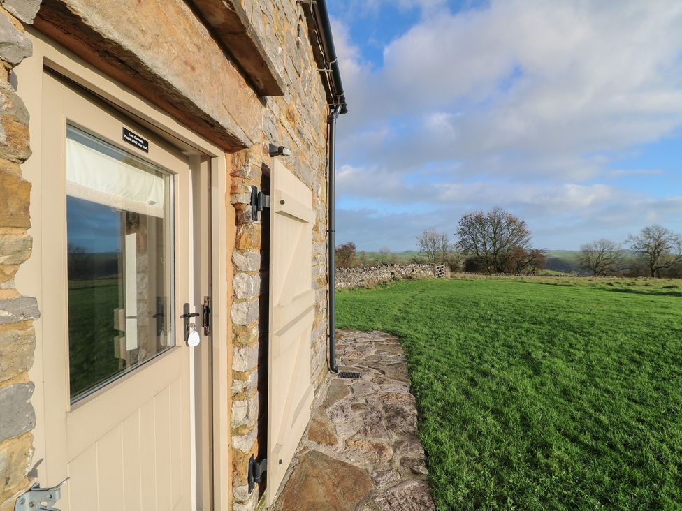 A door and window at Little Barn in Leek