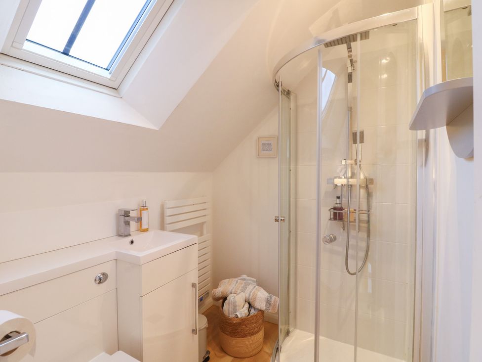 A bathroom with shower and sink at Little Barn in Leek