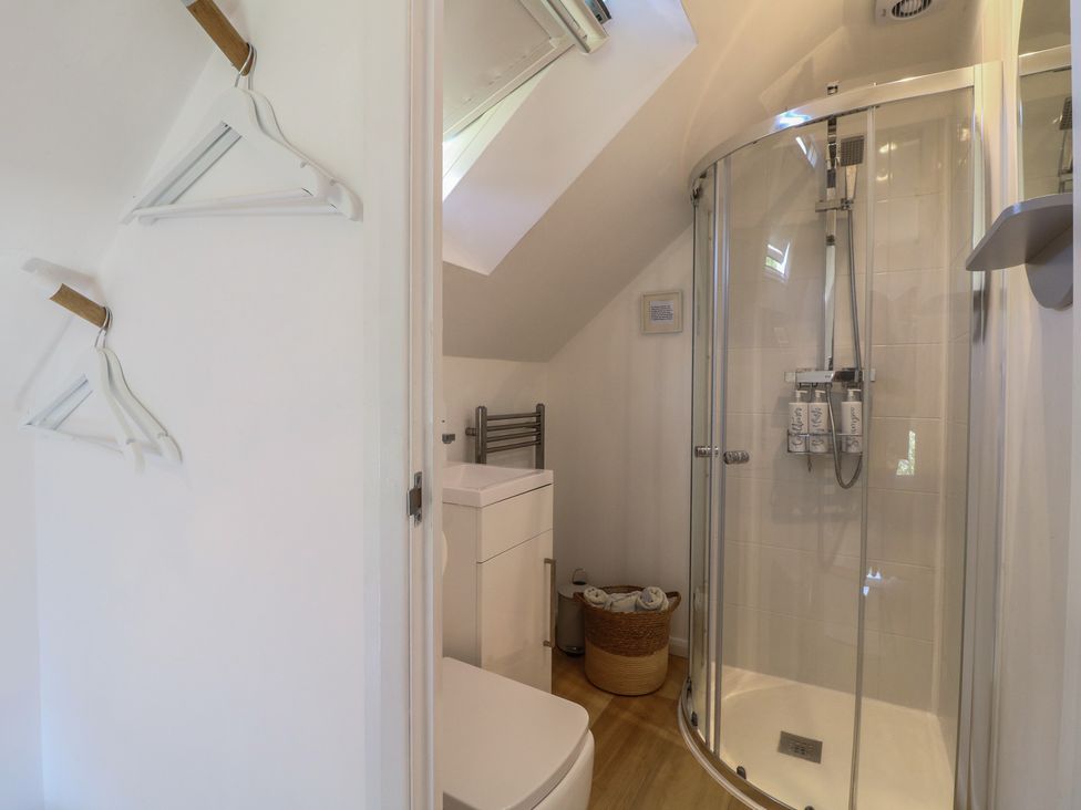 A bathroom with a shower and toilet at Little Barn in Grindon