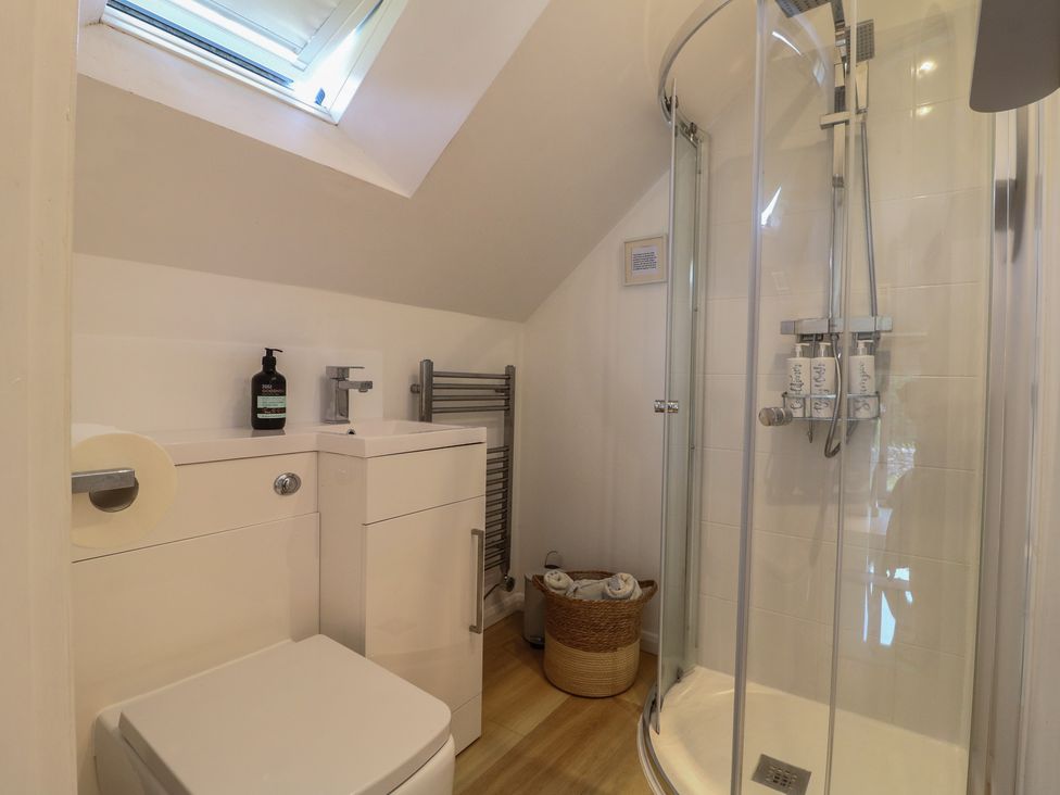 A bathroom with a shower and toilet at Little Barn in Grindon