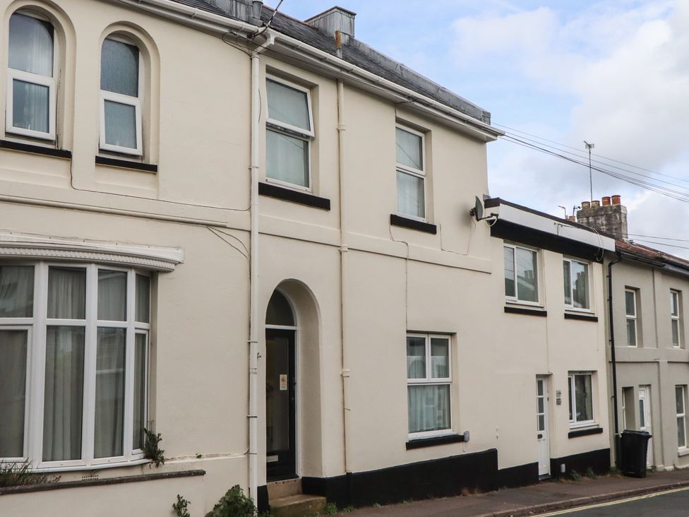 Exterior view of a house with windows and a door at Petitor Mews