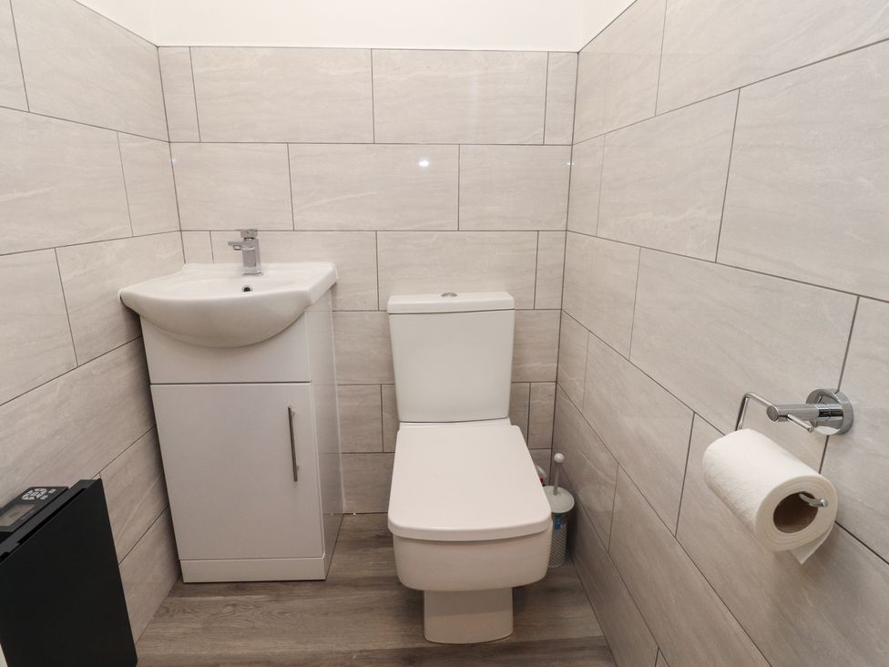 A bathroom with a sink and toilet at 38a Yorkshire Street