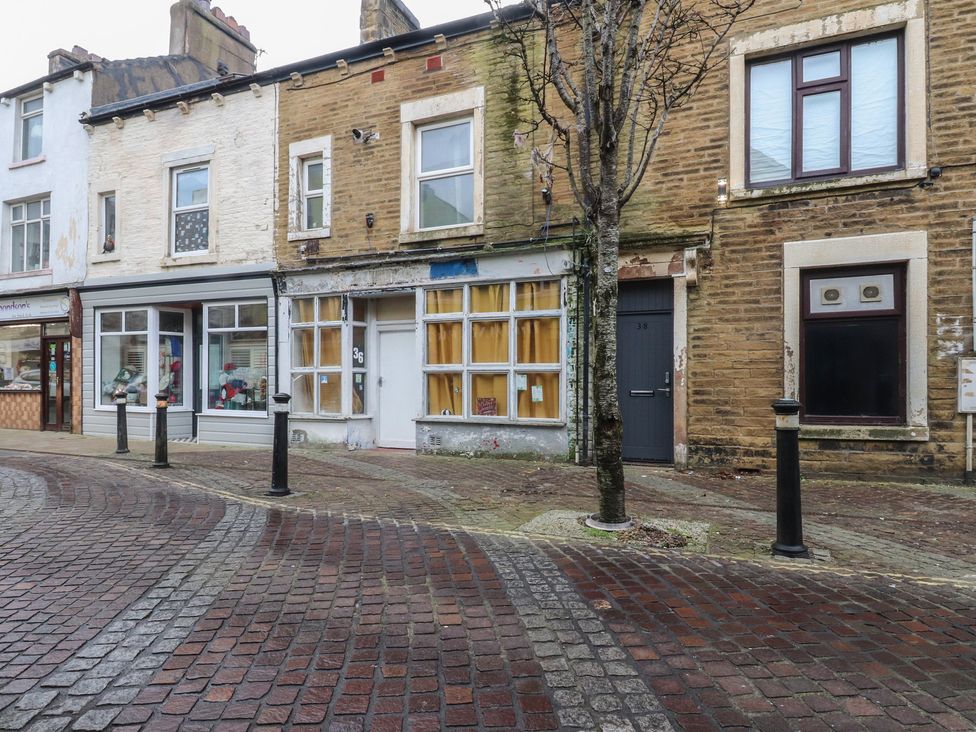 An outdoor view of buildings with windows and doors at 38a Yorkshire Street
