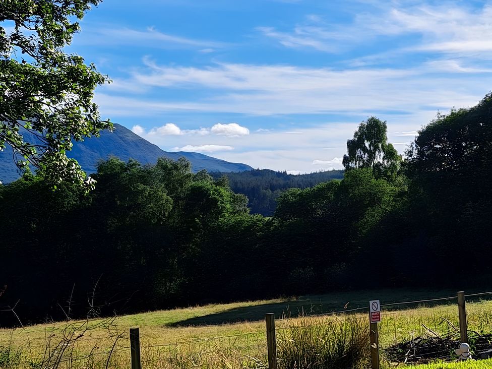 A landscape with trees and mountains at The Posh Bothy 2 in Roy Bridge