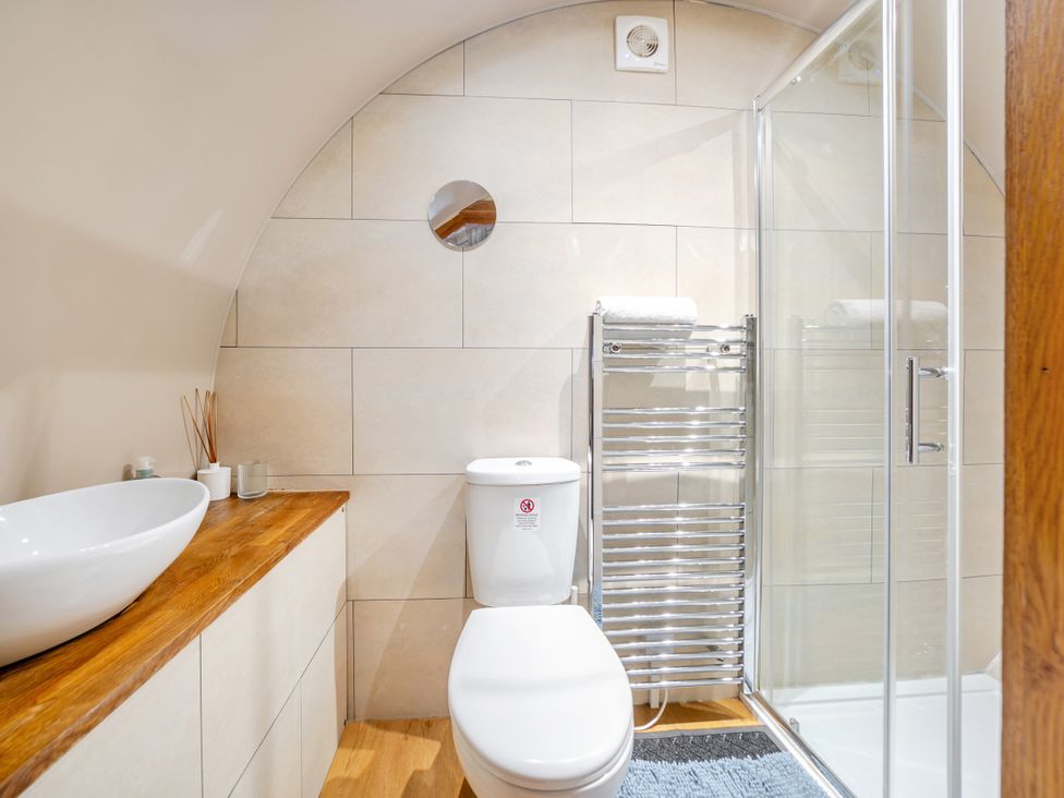 A bathroom with shower and toilet at Cosy Escape in Minster On Sea