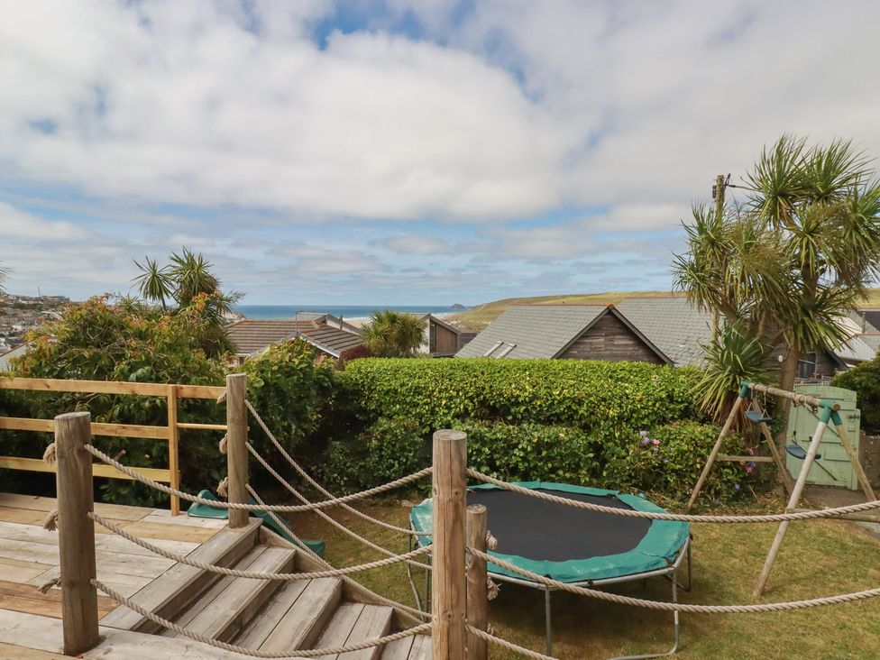 An outdoor area with a trampoline and plants at 3A Grannys Lane in Perranporth