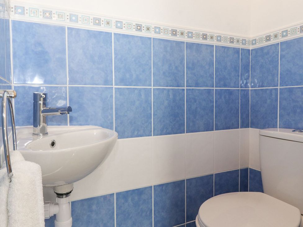 A bathroom with a sink and toilet at Wansfell View in Ambleside