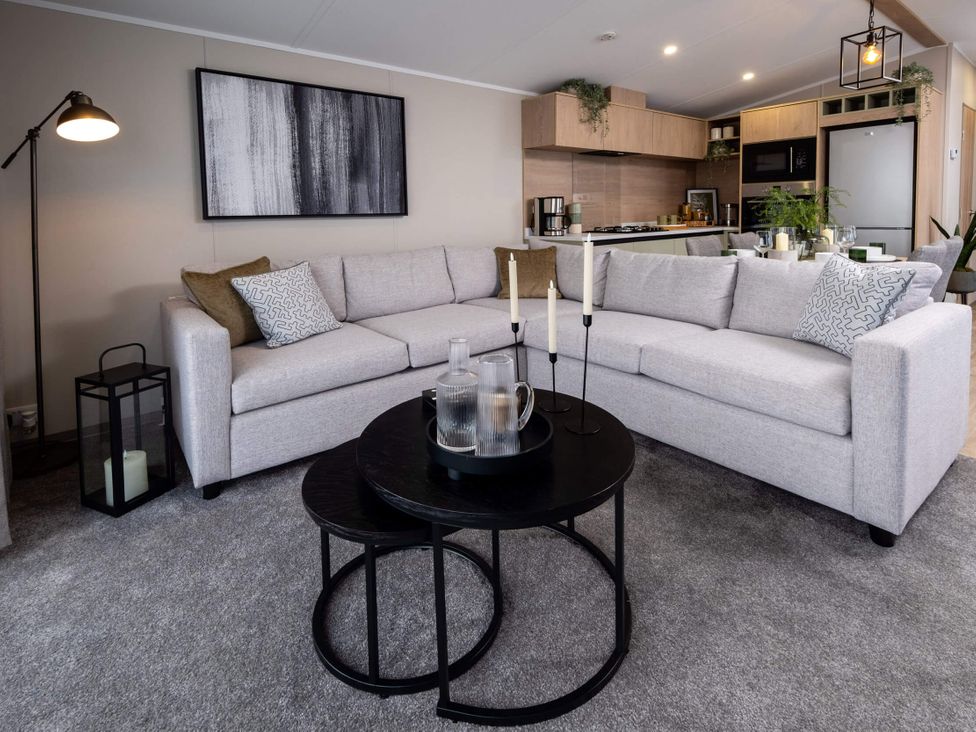 A living room with a sofa and coffee table at Arlington 40 x 14 Three Bed - 2 in Northwich