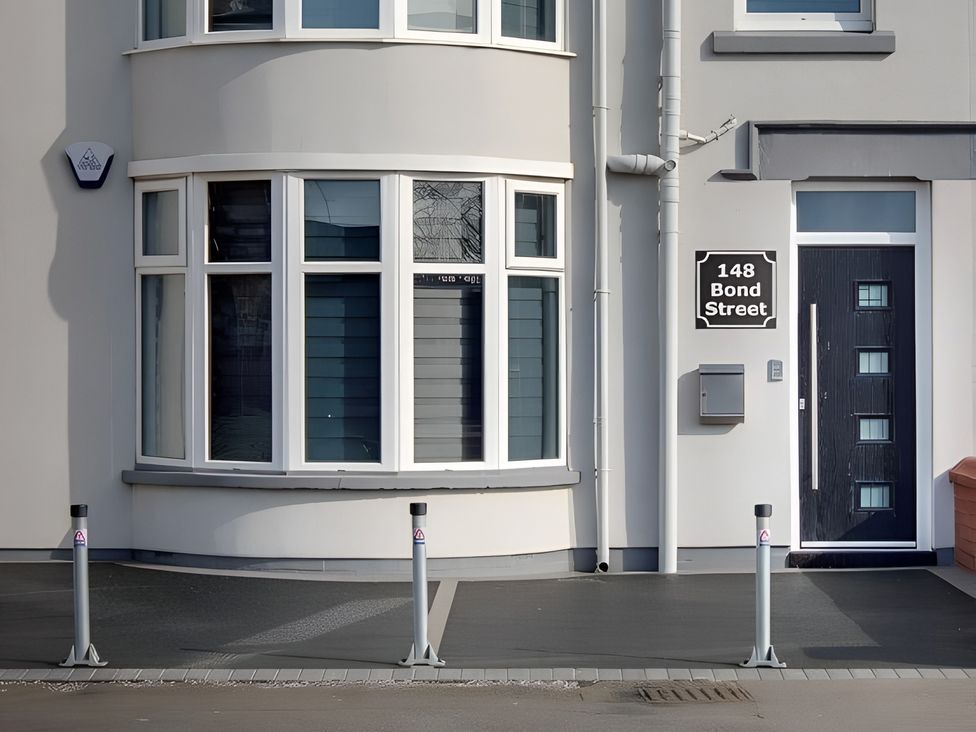 The front of a building with windows and a door at Apartment 1 Blackpool