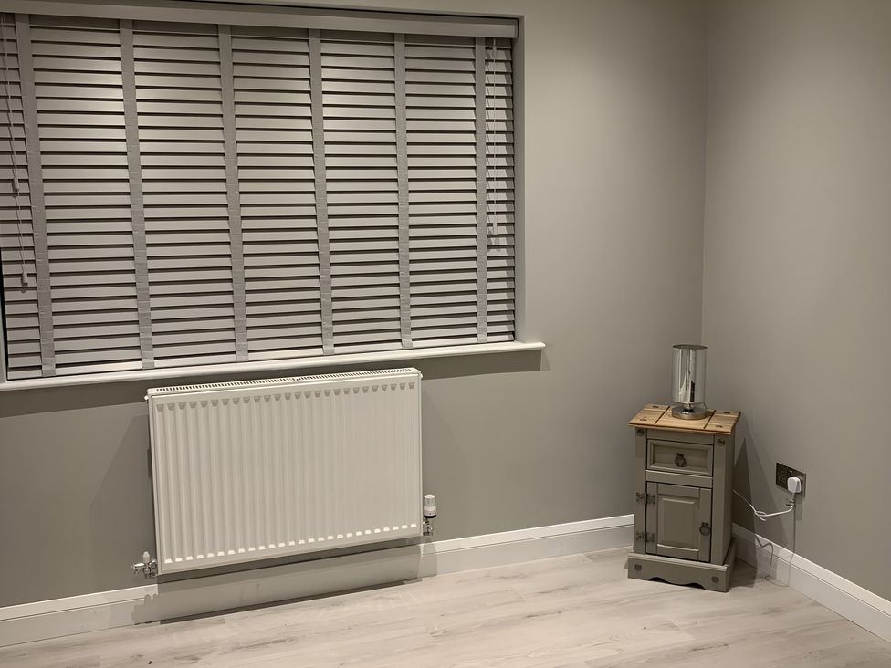 A room with a window and radiator at 43 Goose Green Road, King's Lynn