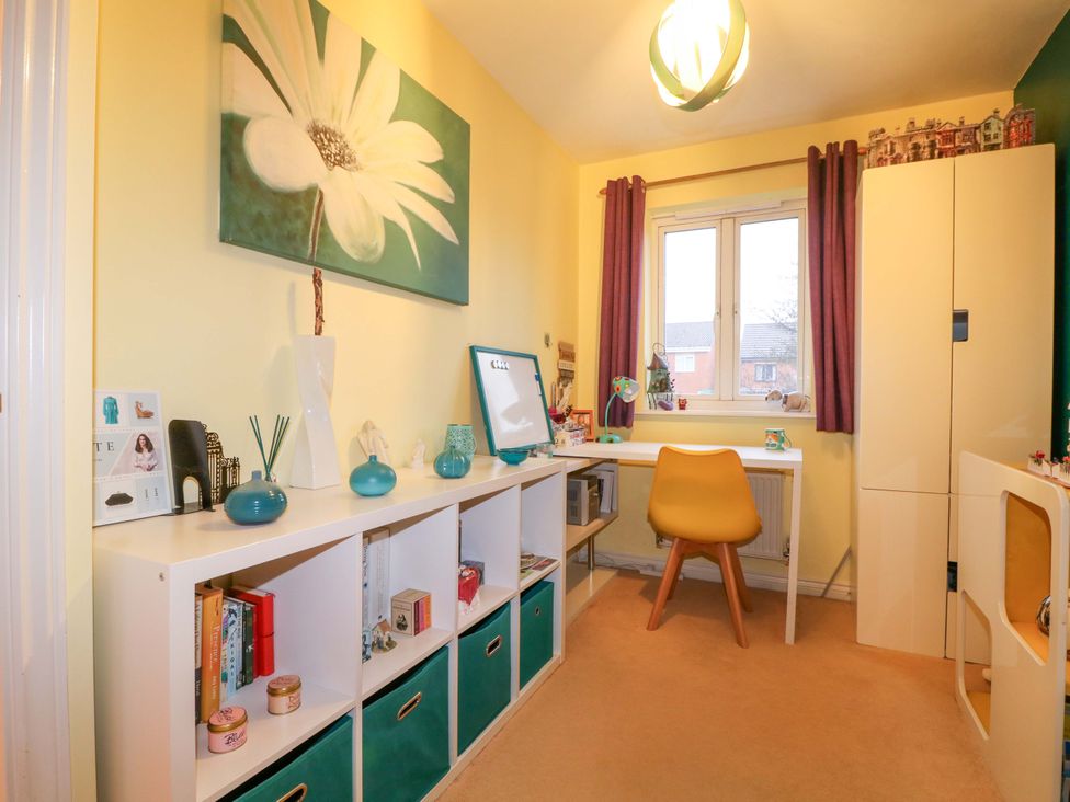 An office with a desk and bookshelf at 41 Lower Birches Way in Rugeley