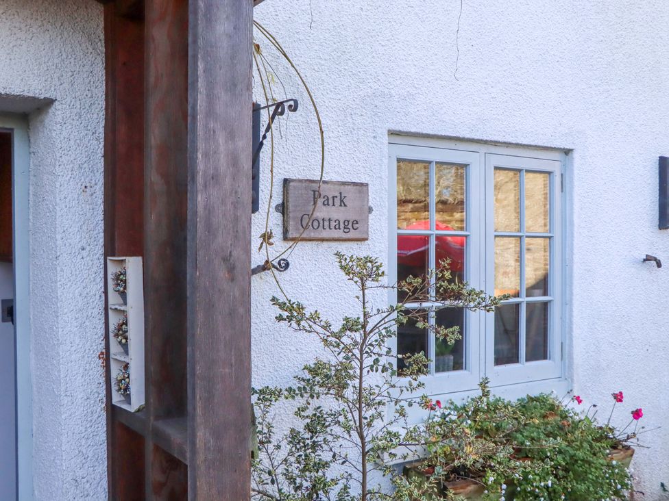 An entrance with a sign for Park Cottage in Kingsbridge