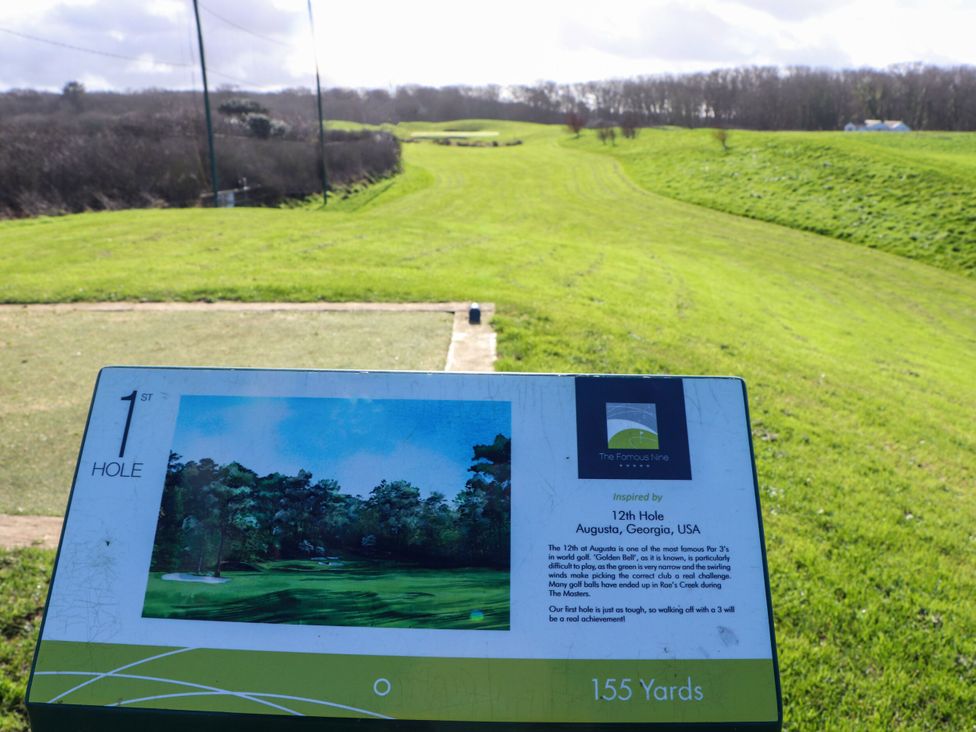 A golf course tee sign for the first hole at The Famous Nine in Portreath