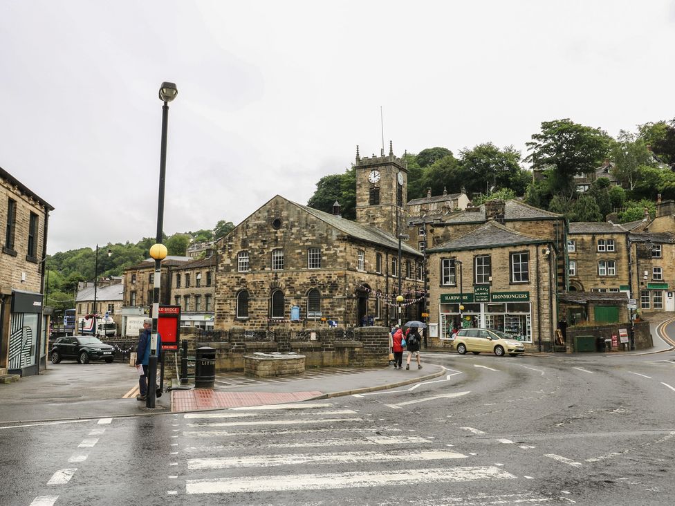 A street view with shops and a clock tower at The Annex at Ryefield Lodge