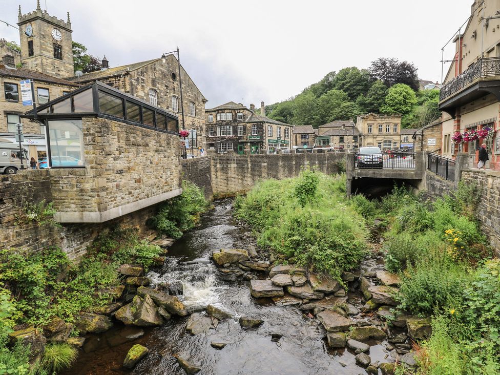 A view of a river and buildings with a car park at The Annex at Ryefield Lodge 
