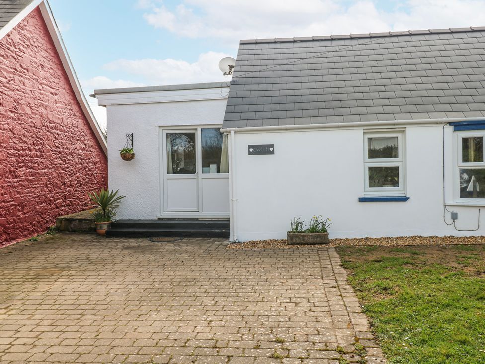 A house entrance with door and windows at The Cwtch in Haverfordwest