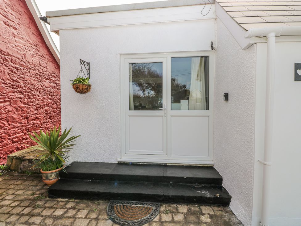 An entrance with a door and steps at The Cwtch in Haverfordwest