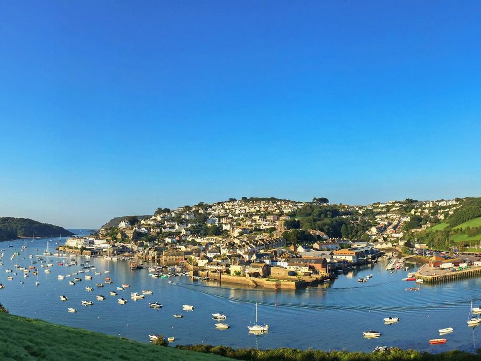 A view of a harbor with boats and houses at 3 The Salcombe, Salcombe