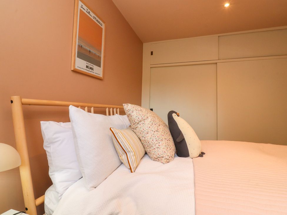 A bedroom with a bed and pillows at Kirk Yett in Linton Falls near Skipton
