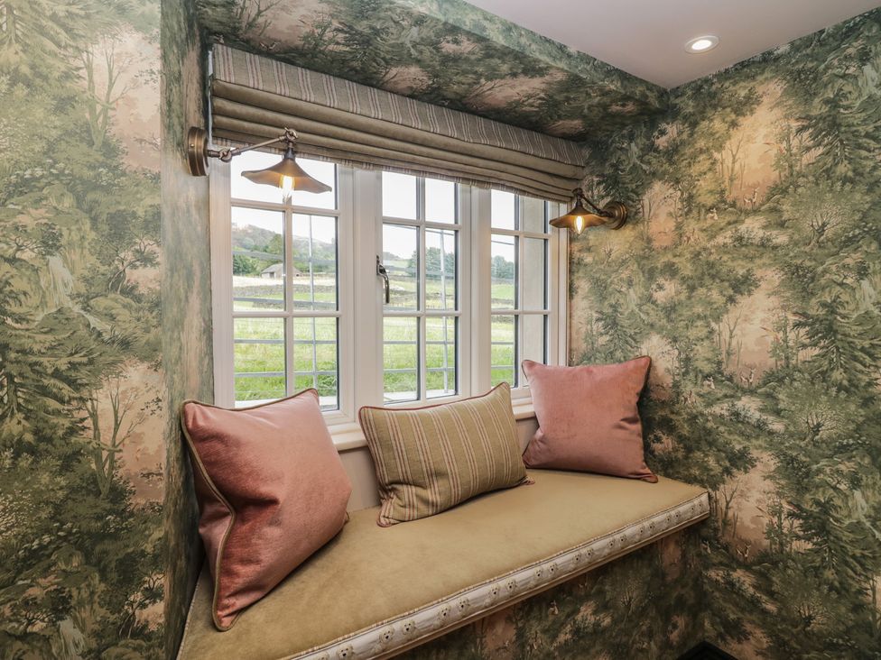 A nook with a window and seating at Low House Cottage Ayside near Newby Bridge