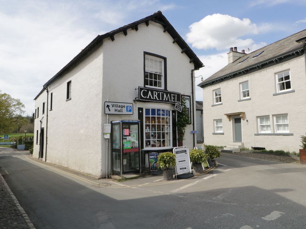 A shop with a parking sign in front at Low House Cottage Ayside near Newby Bridge