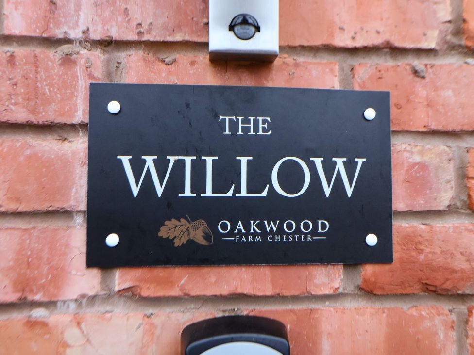 A nameplate displaying The Willow at Oakwood Farm in Chester