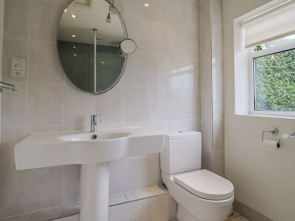 A bathroom with a sink and toilet at Hawksdown in Lyme Regis