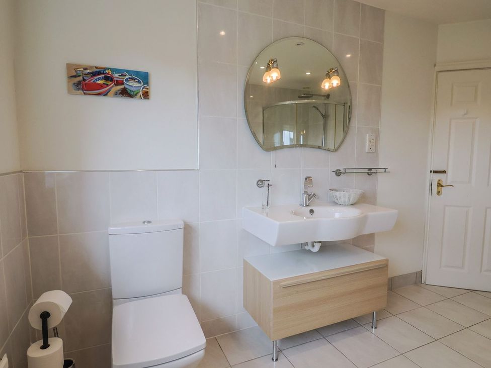 A bathroom with a sink and toilet at Hawksdown in Lyme Regis
