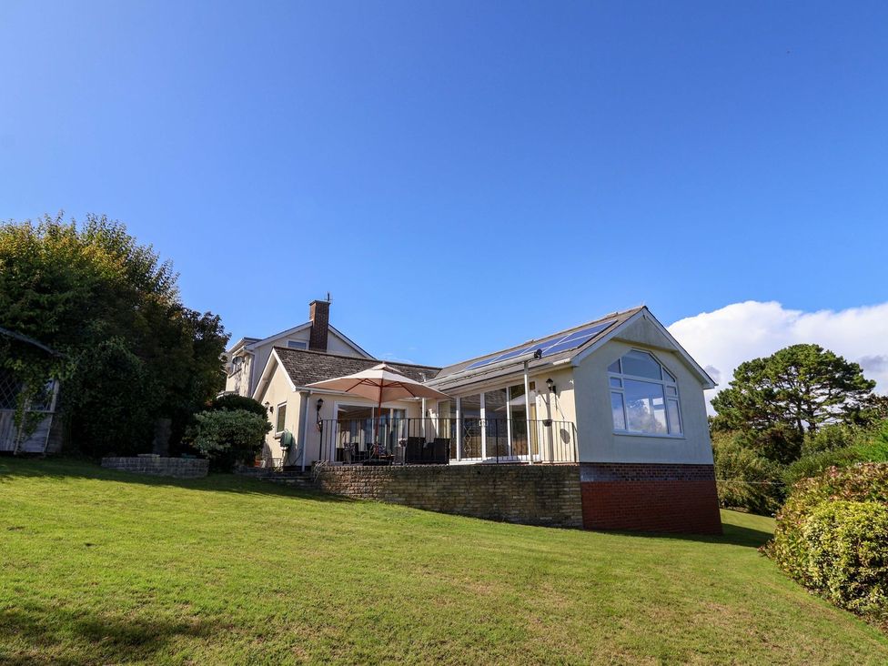 A house with a terrace and garden at Hawksdown in Lyme Regis