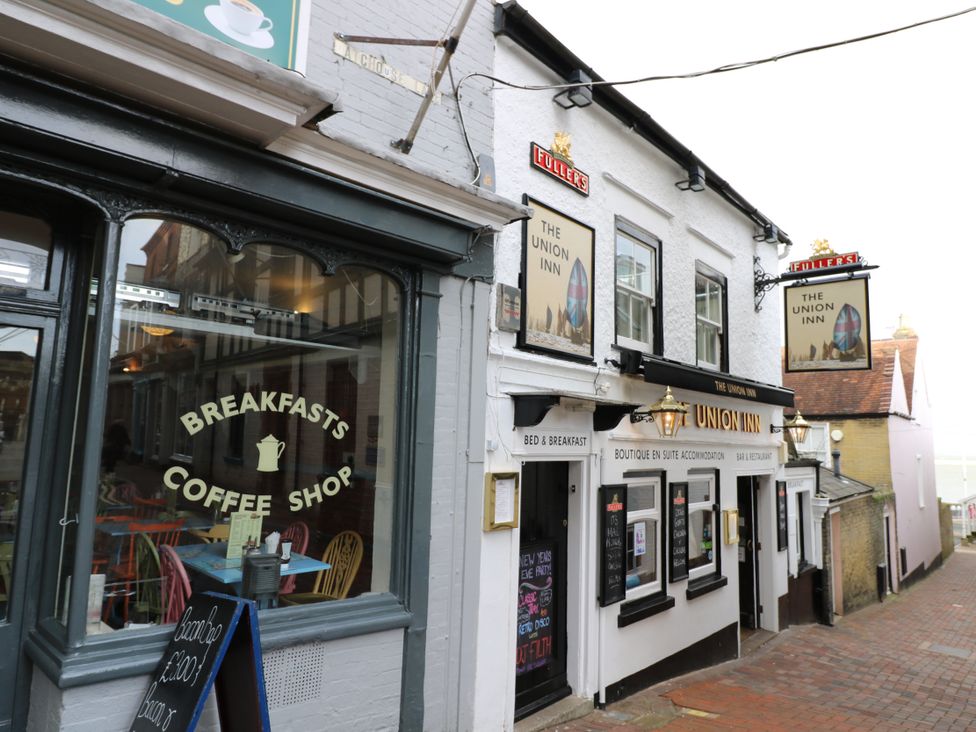 A coffee shop and bed and breakfast with signs at Red Brick Haven in East Cowes, Isle Of Wight