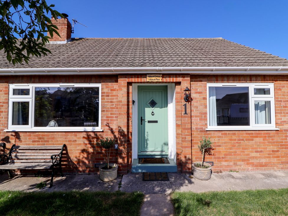 A brick house with front door and windows at 1 Ashcott Place Burnham-On-Sea