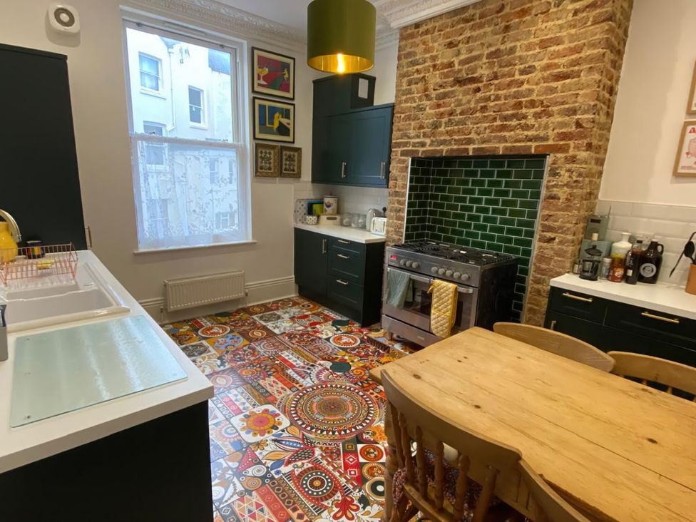 A kitchen with a sink and oven at 21 Gensing Road St. Leonards-on-Sea