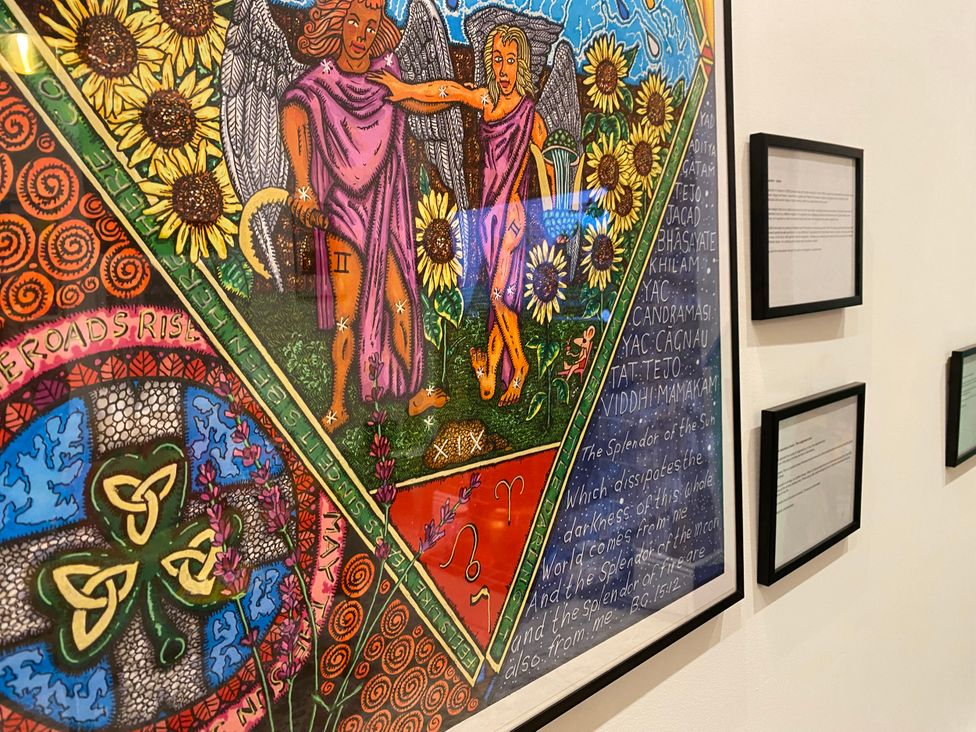 An artwork featuring angels and sunflowers with text at 21 Gensing Road St. Leonards-on-Sea