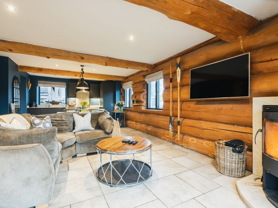 A living room with a sofa and coffee table at The Lookout in Addingham