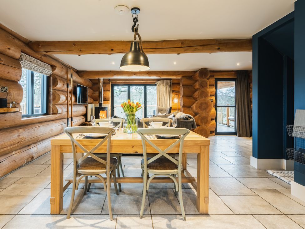 A dining room with a table and chairs at The Lookout in Addingham
