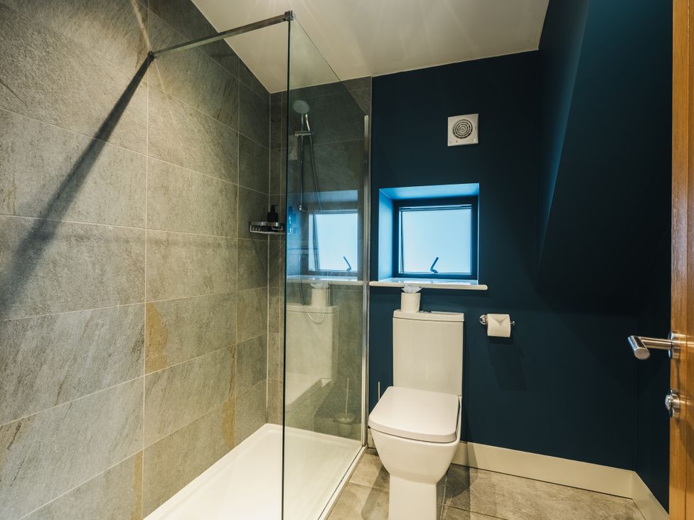 A bathroom with a shower and toilet at The Lookout in Addingham