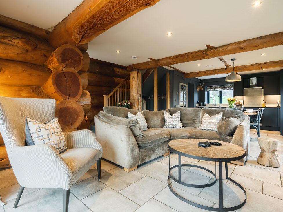 A living room with a sofa and coffee table at Apres Ski in Addingham