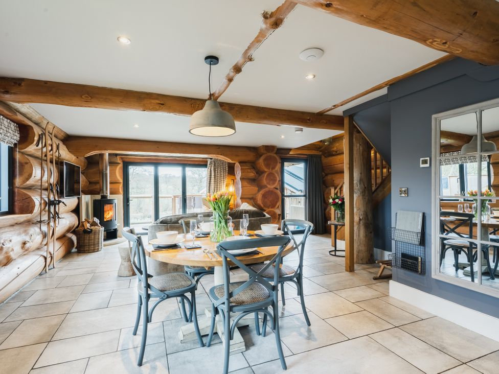 A living room with a table and chairs at Apres Ski in Addingham