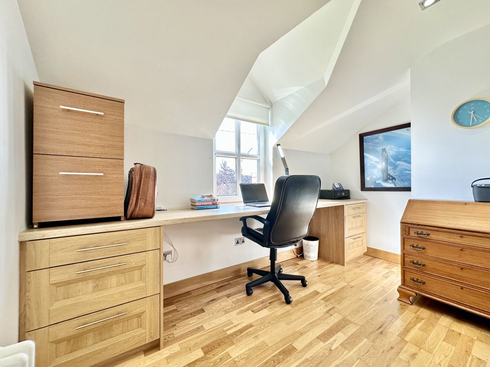An office with a desk, chair and storage at Seeview in Charleville