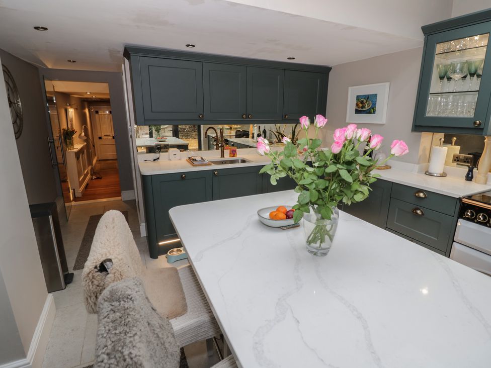 A kitchen with a sink and countertop at 23 New Church Street in Tetbury