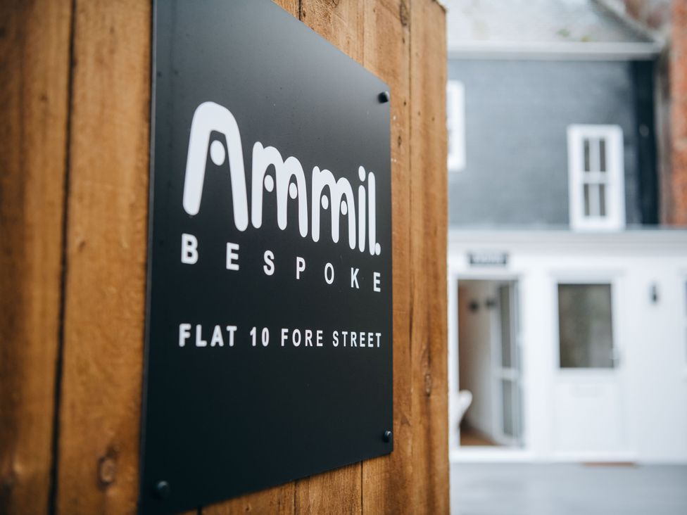 A sign for Ammil Bespoke at Flat 10 Fore Street