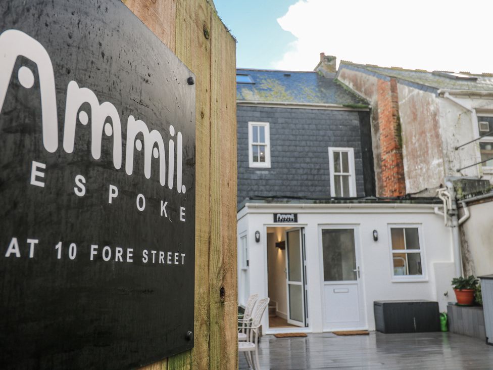 An outdoor area with a sign and entrance at Ammil Bespoke in St Ives