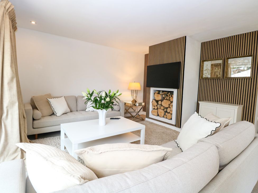 A living room with sofa and coffee table at Three Ways South Lopham near Garboldisham